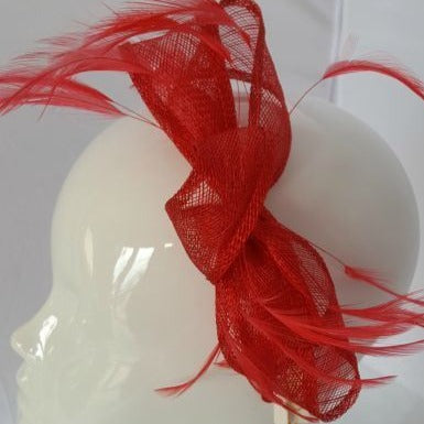 Red bow and feather fascinator