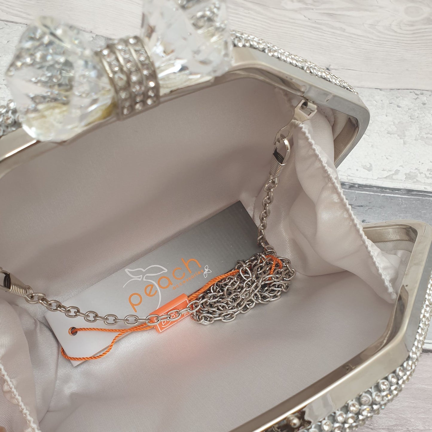 Photo of a Silver diamante clucth bag with large double crystal clasp
