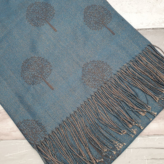 Photo of a Teal Blue scarf featuring the tree of life with a rose gold sheen