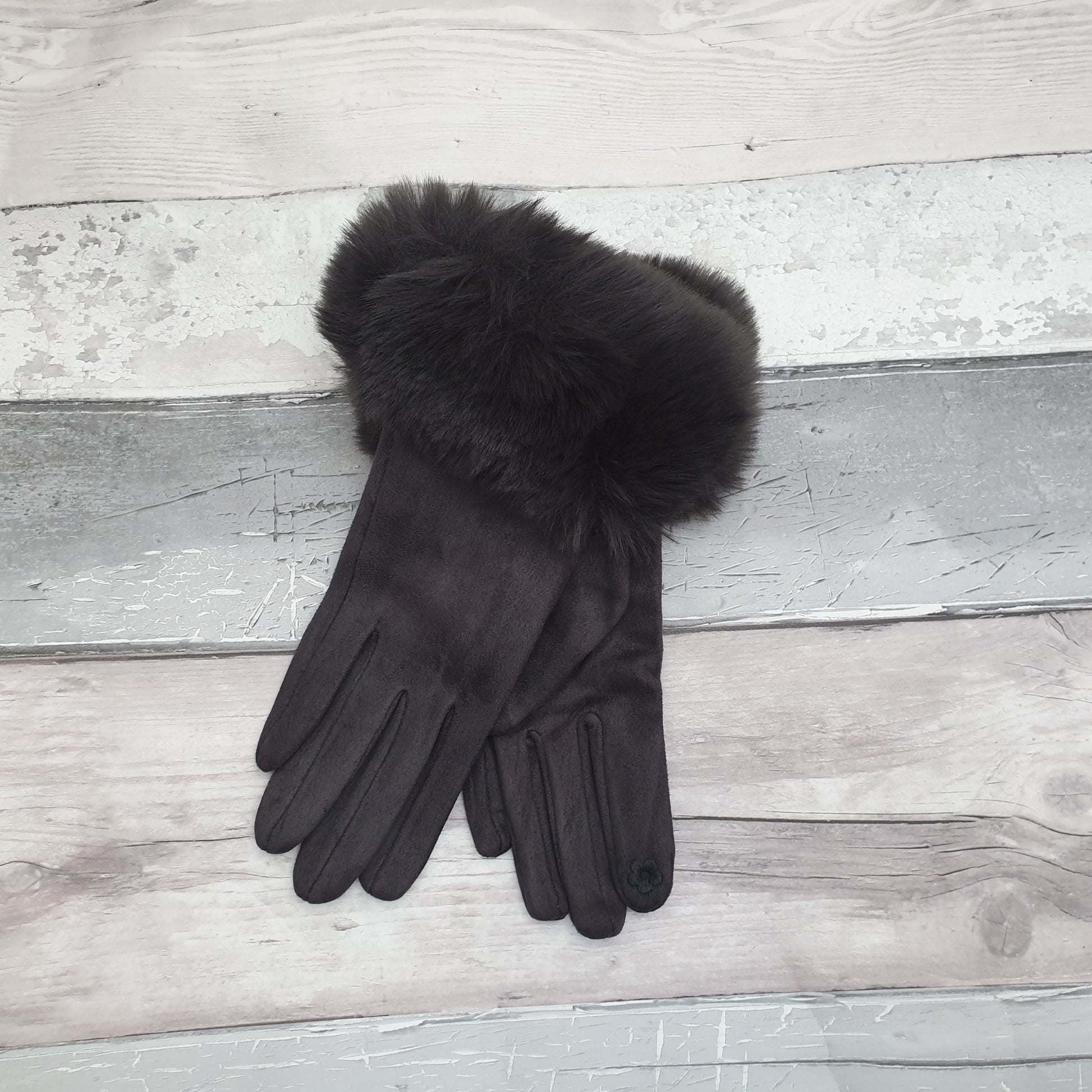 Photo of a pair of dark grey gloves with a faux fur cuff