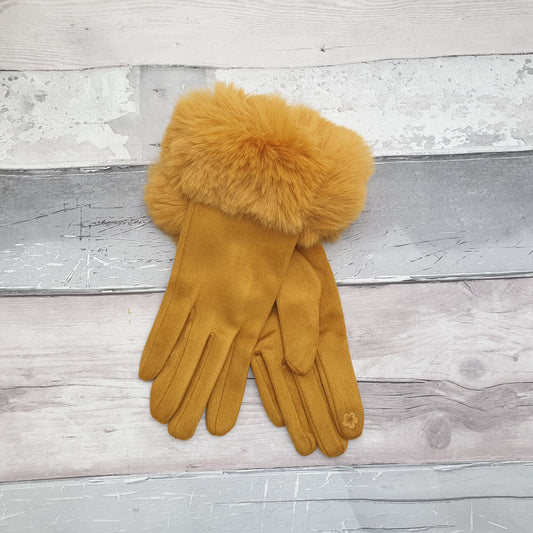 Photo of a pair of mustard coloured gloves with a faux fur trim