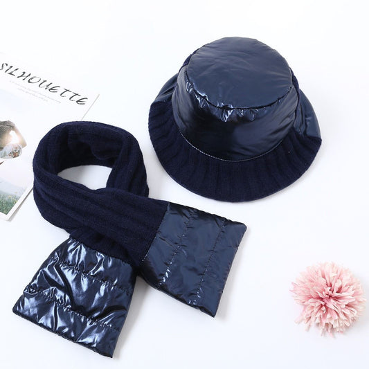 Photo of a metallic puffa style hat and scarf set in Navy