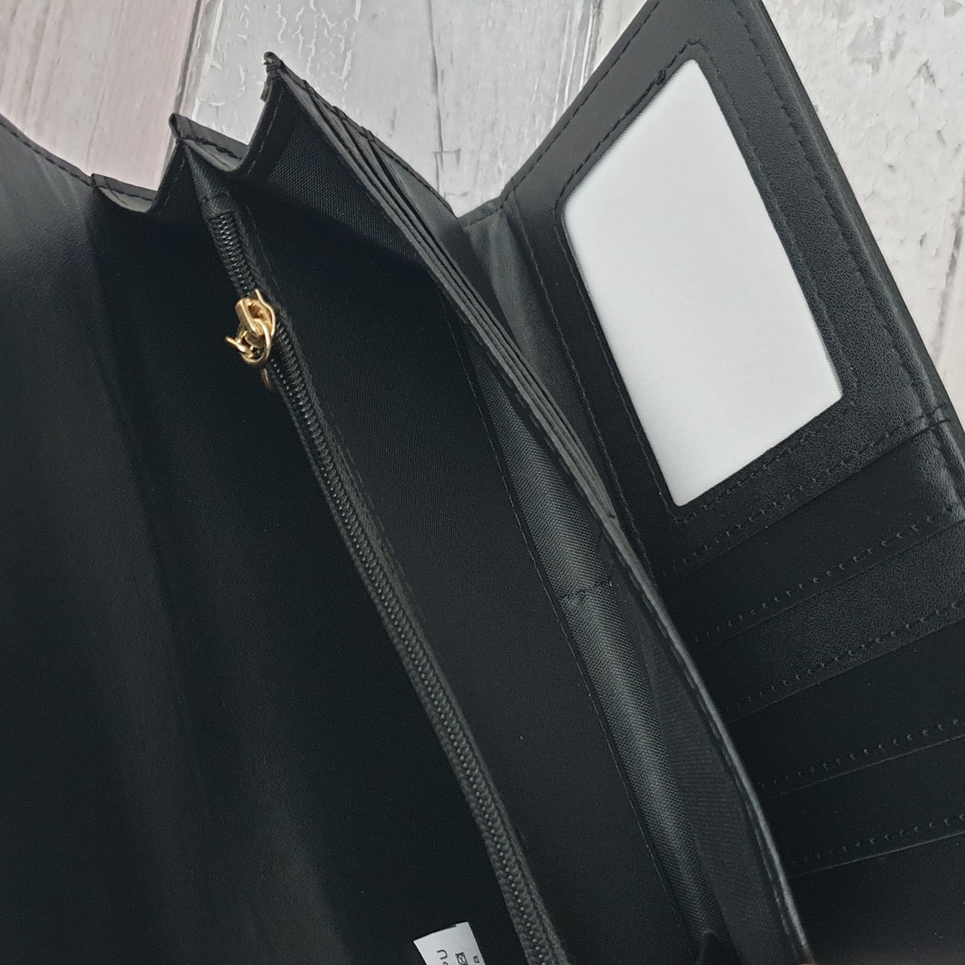 Photo of a gift boxed black purse