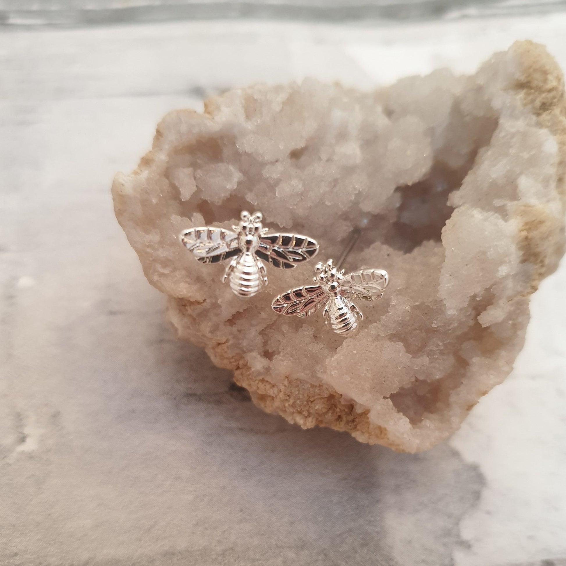 Photo of a pair of silver plated Honey Bee stud earrings