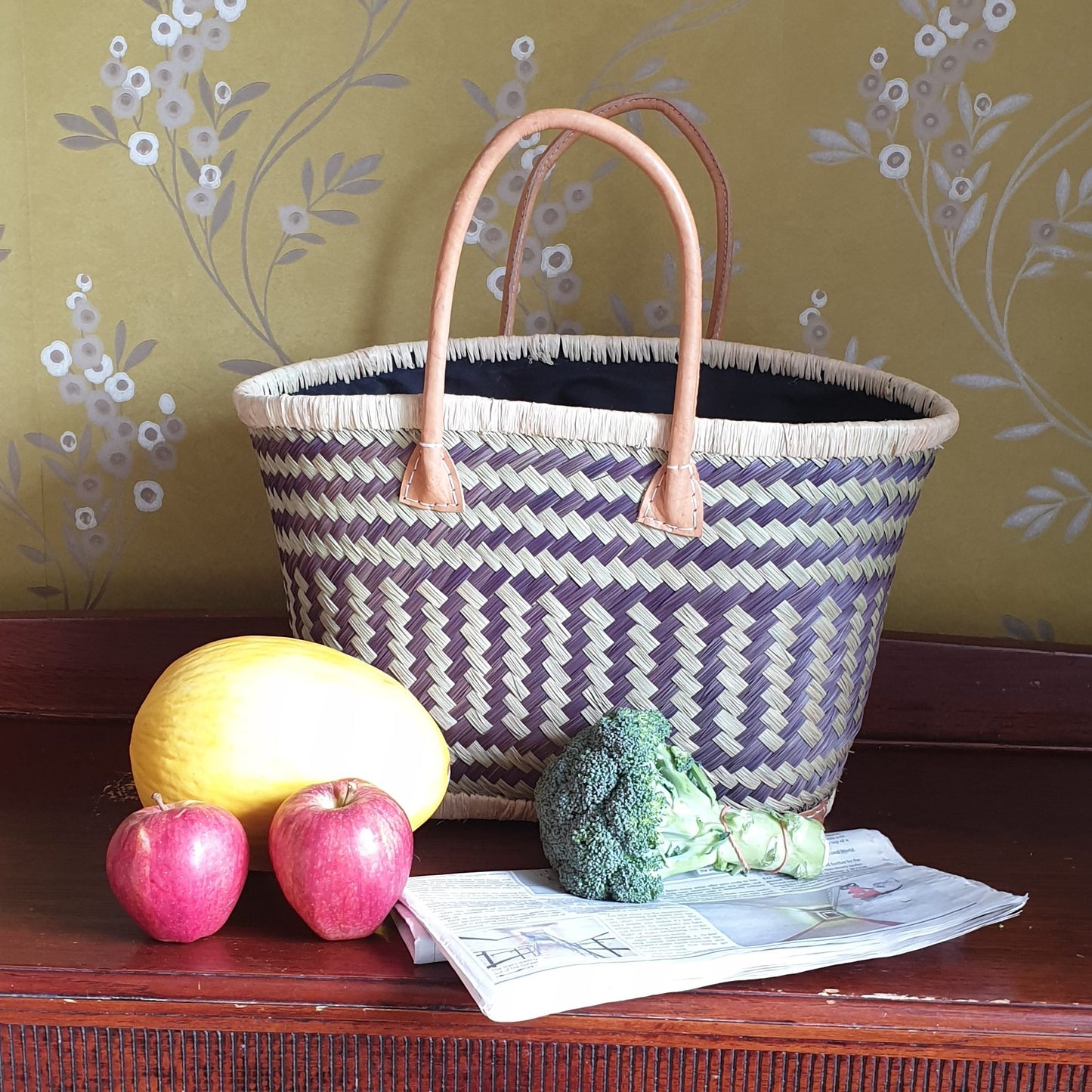 Hand woven black palm basket with leather handles