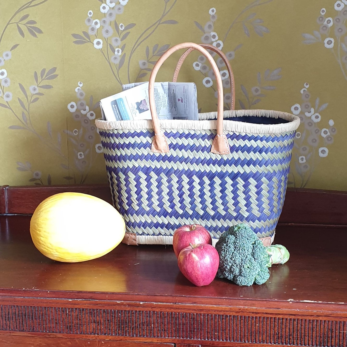 Hand woven blue basket with leather handles