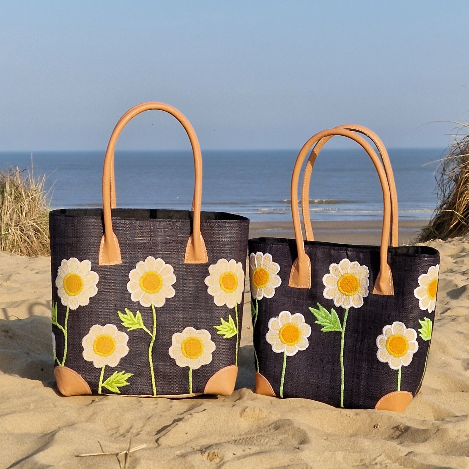 Black Raffia Basket decorated with white daisies.