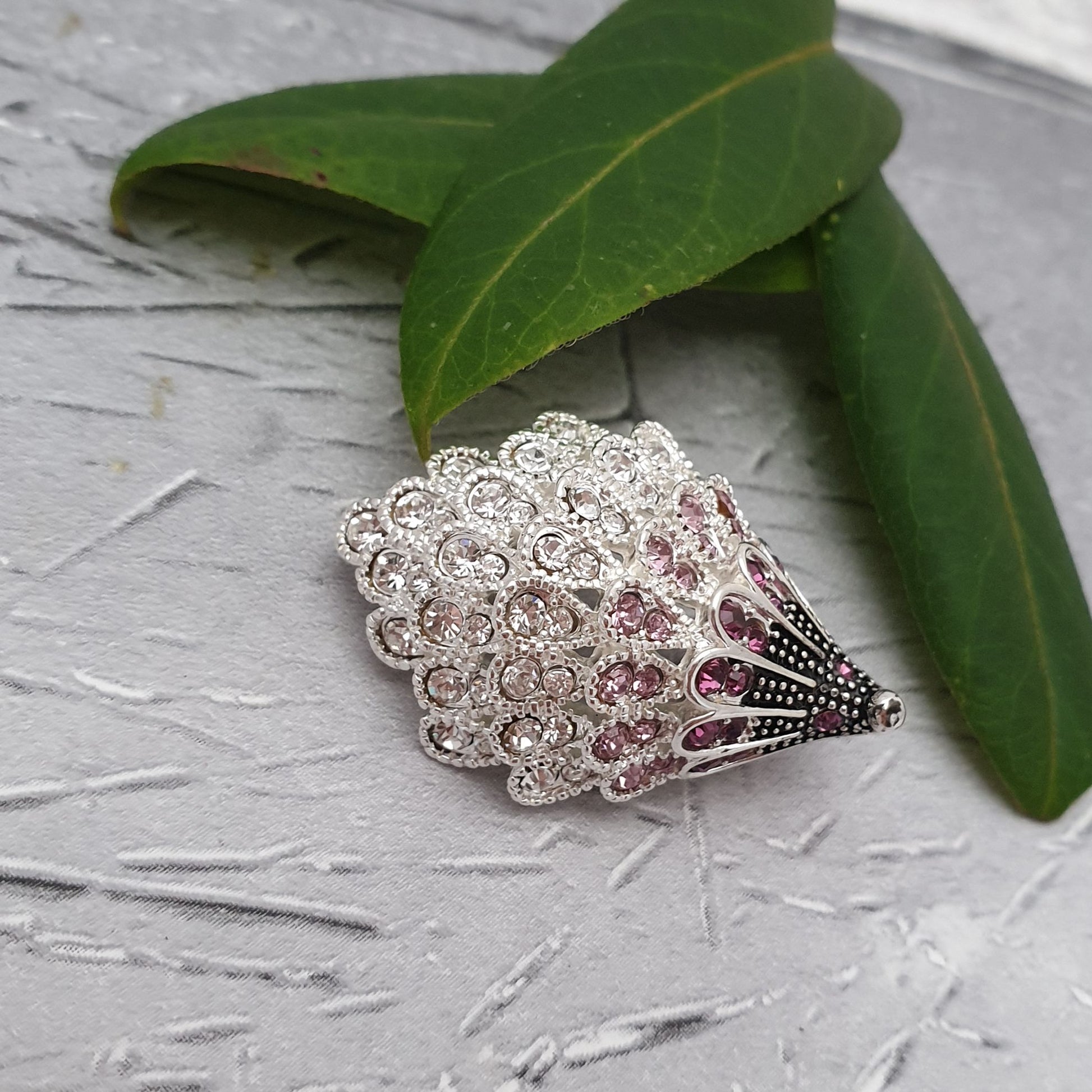 Hedgehog brooch decorated in pink diamante crystals