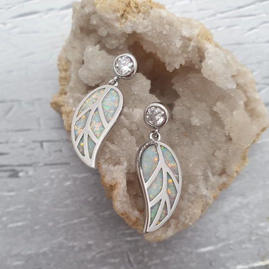 Opalescent crystal shaped leaves droping from a crystal stud earring.