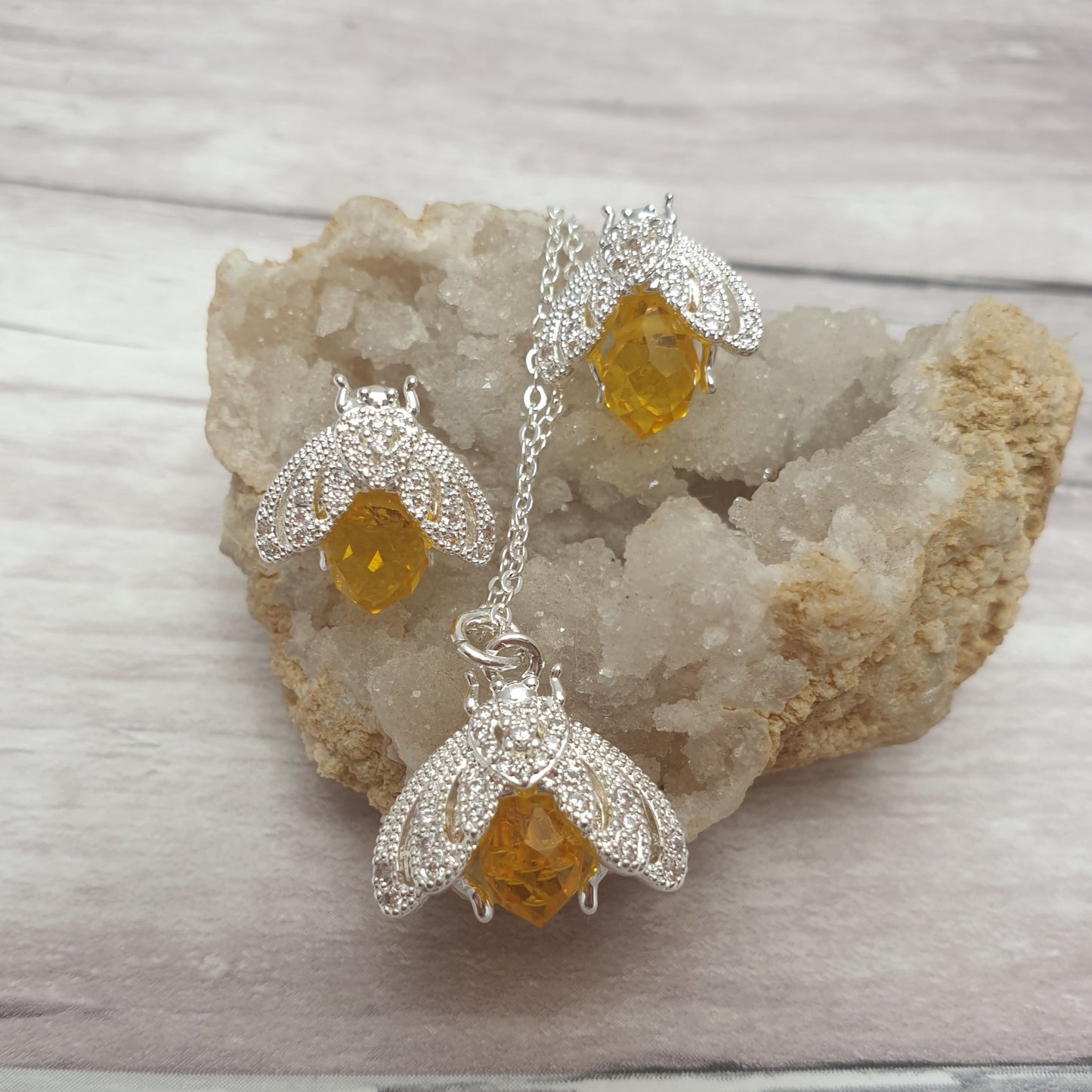 Matching yellow bee crystal necklace and earrings.