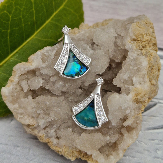 Art deco fan shaped earrings, inset with New Zealand Paua shell in stunning blue green tones.