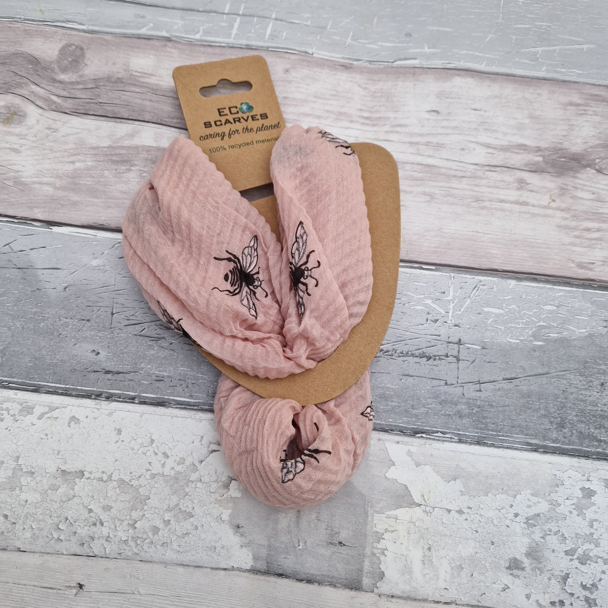 Pink crinkle neck scarf with bee print.