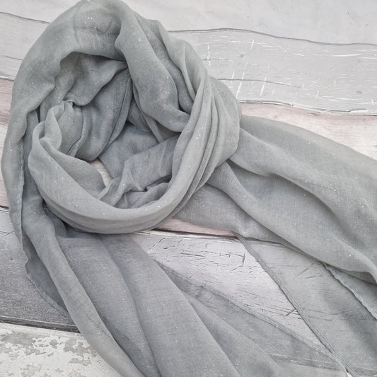 Dove grey scarf with a silver sparkle finish.