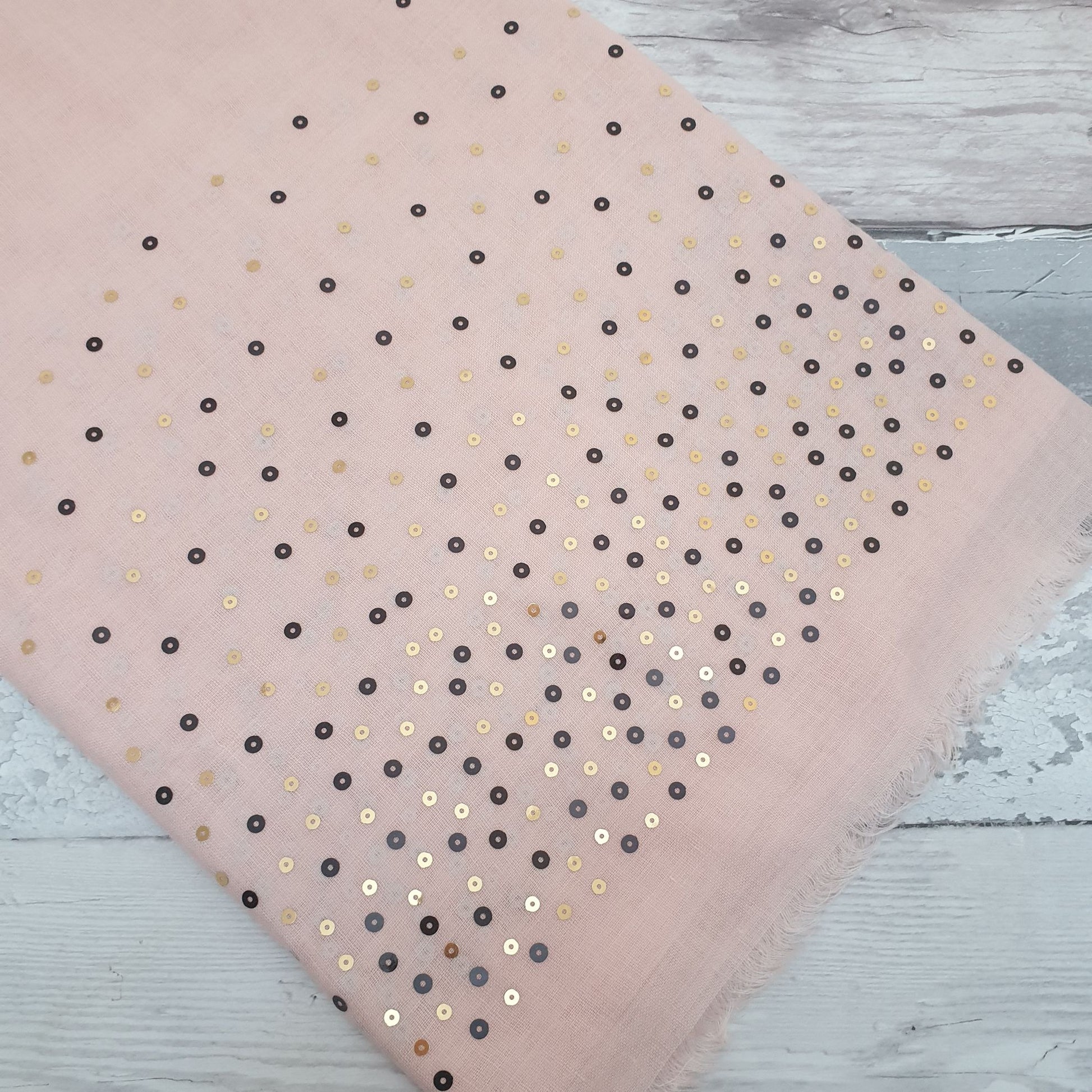 Pale Pink scarf decorated with sequins of gold, silver, black and bronze.