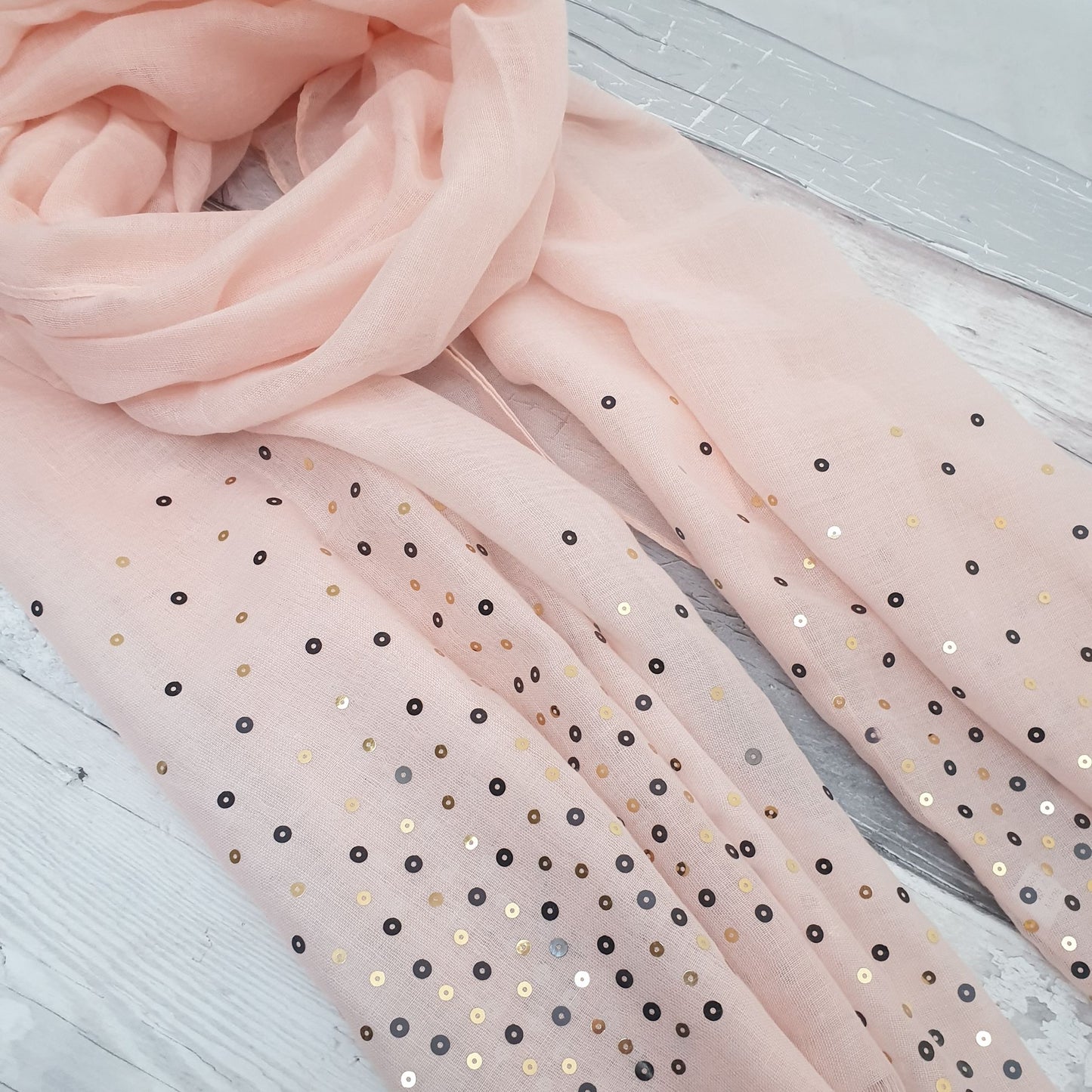 Pale Pink scarf decorated with sequins of gold, silver, black and bronze.