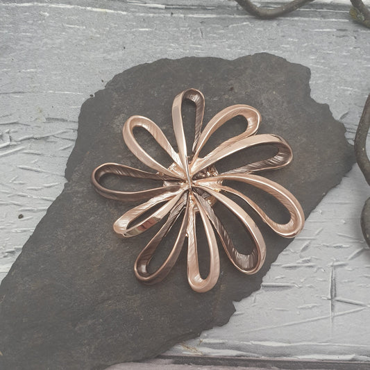 Rose gold and bronze coloured flower brooch