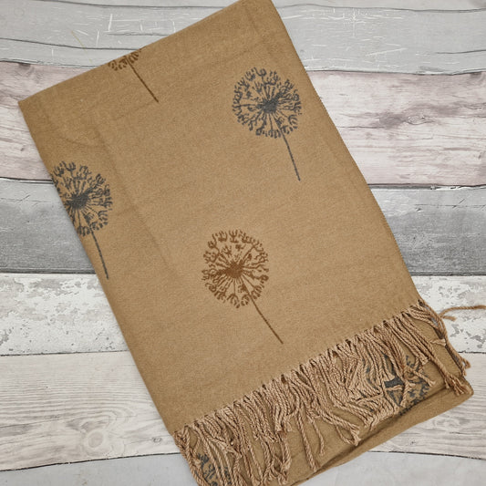 Cashmere blended scarf in a camel colour decorated with dandelion clocks.