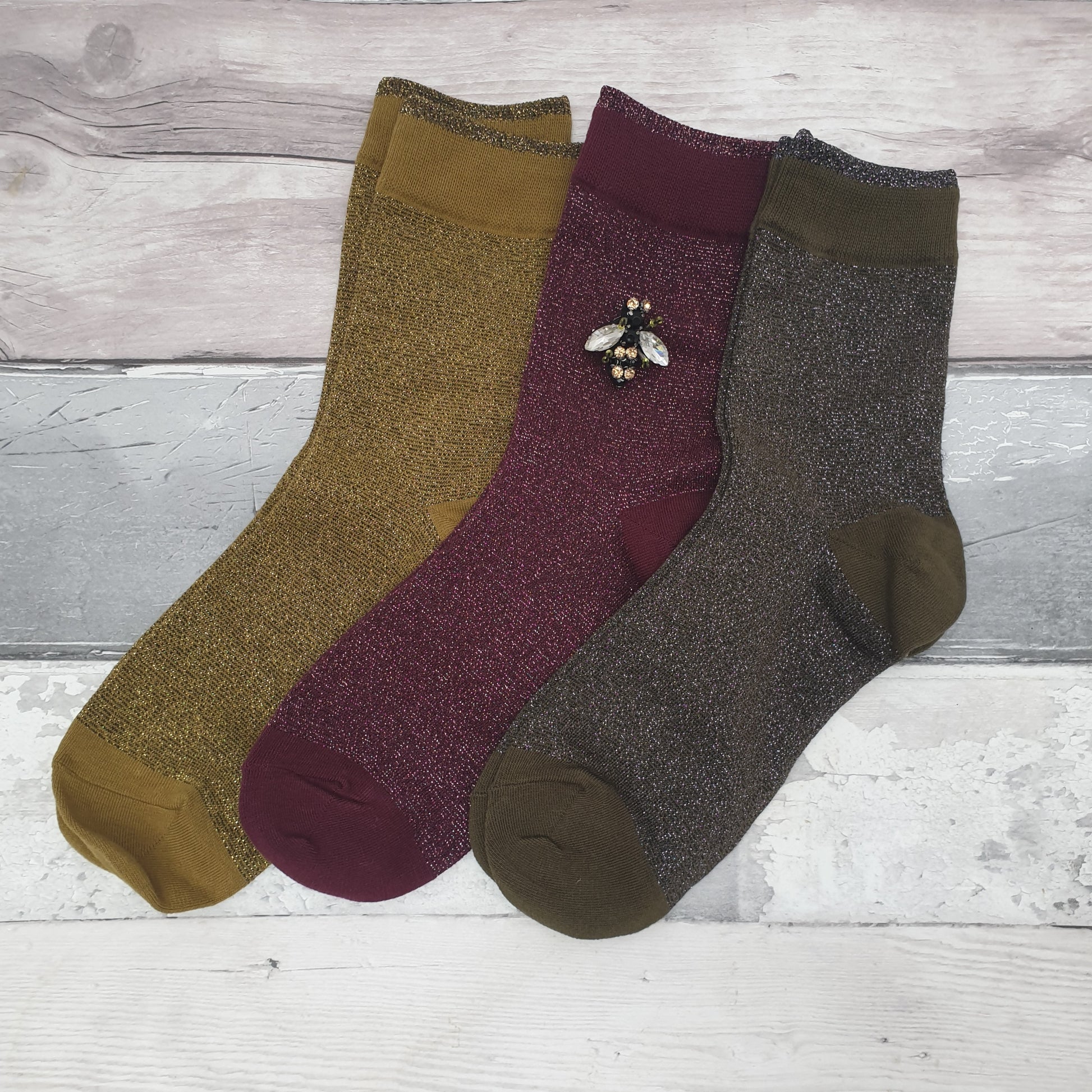 3 Pairs of sparkly socks in Olive, Burgundy and Pewter. Bee Brooch made from recycled Glass.