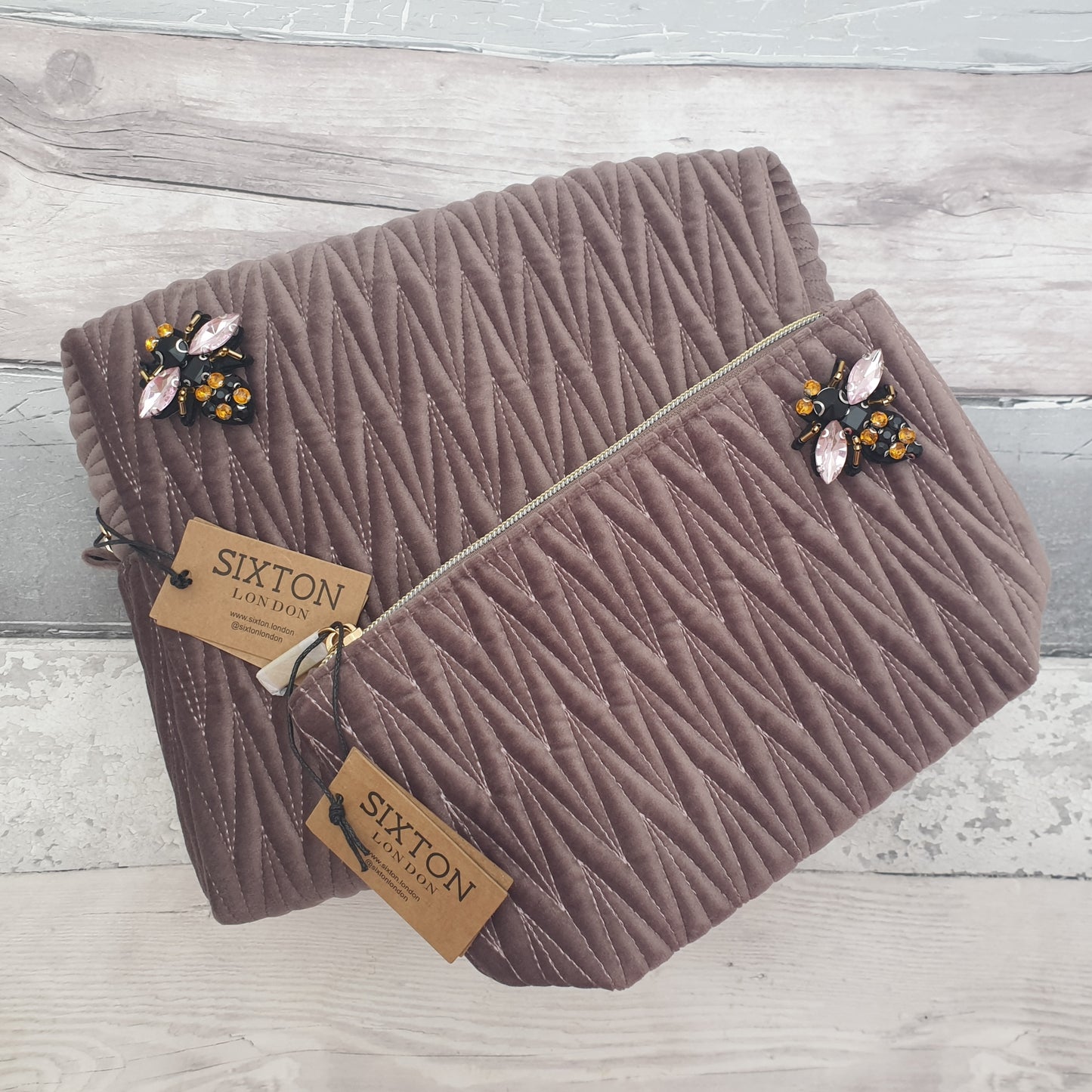Matching Mushroom coloured velvet quilted wash and make up bags with a removable bee brooches.