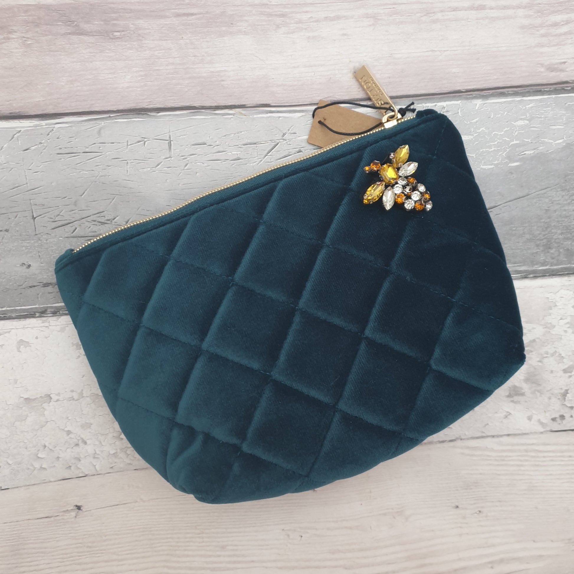 Teal Blue Make Up Bag made from quilted velvet with a Glass Bee Brooch in Gold.