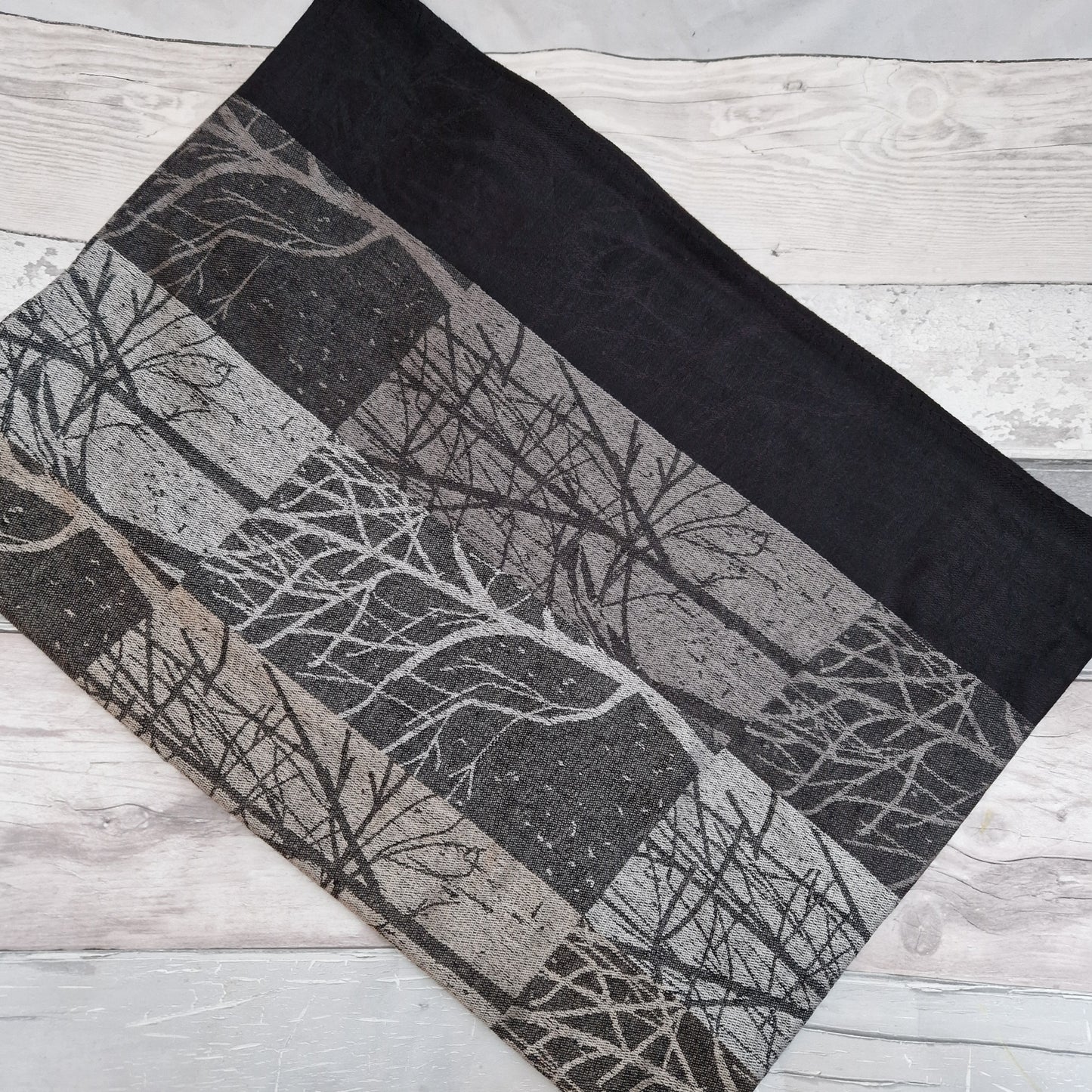 Woodland print scarf in black, silver and bronze.