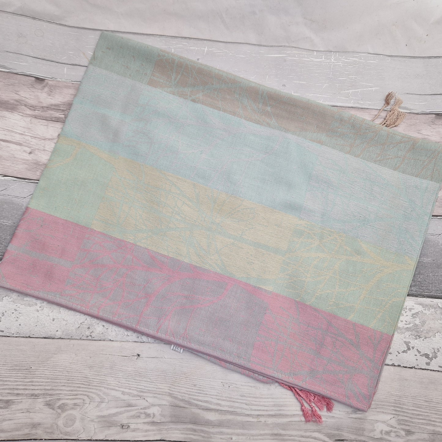 Cashmere blended scarf with woodland tree print. Pretty colour palette of Duck Egg Blue, Pink, Silver Grey and Lemon.