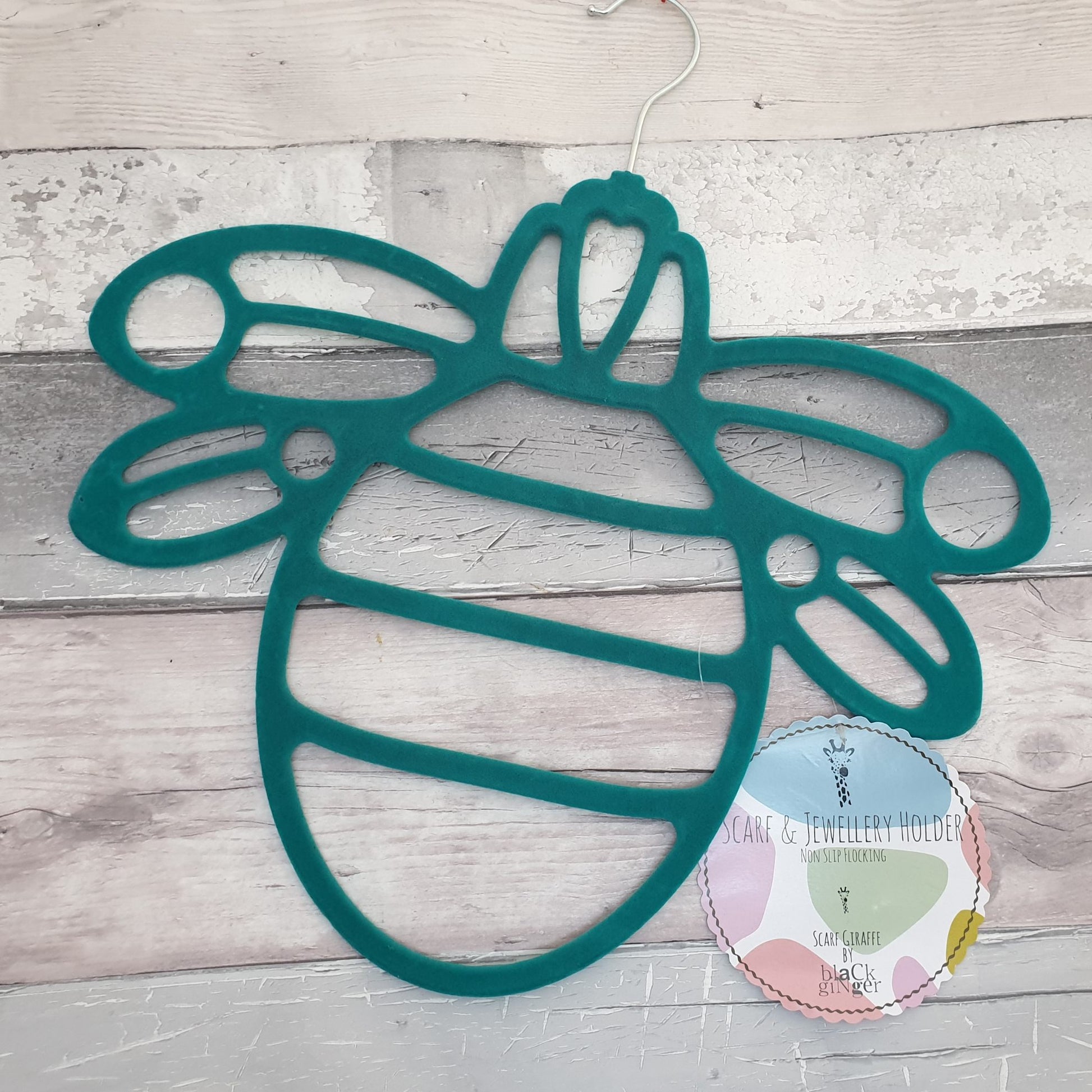 Velvet flocked scarf hanger in the shape of a bee with 19 holes for scarves